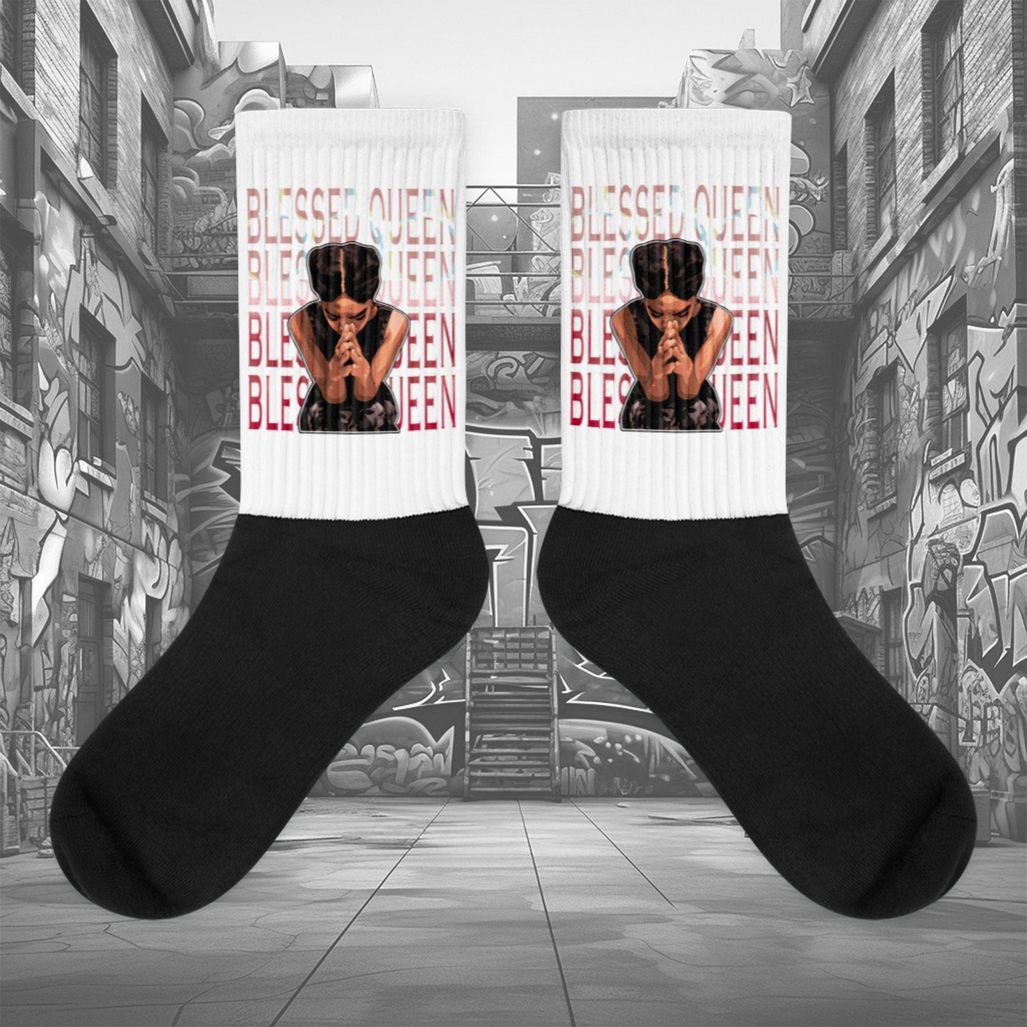  Showcases the view of the socks, highlighting the vibrant 'Blessed Queen' design, which perfectly complements the Air Jordan 1 Retro High OG Next Chapter Spider-Verse sneakers. The intricate pattern and color scheme inspired by the Spider-Verse theme are prominently displayed.  Focusing on the ribbed leg , cusioned bottoms and the snug fit of the socks. This angle provides a clear view of the texture and quality of the material blend.