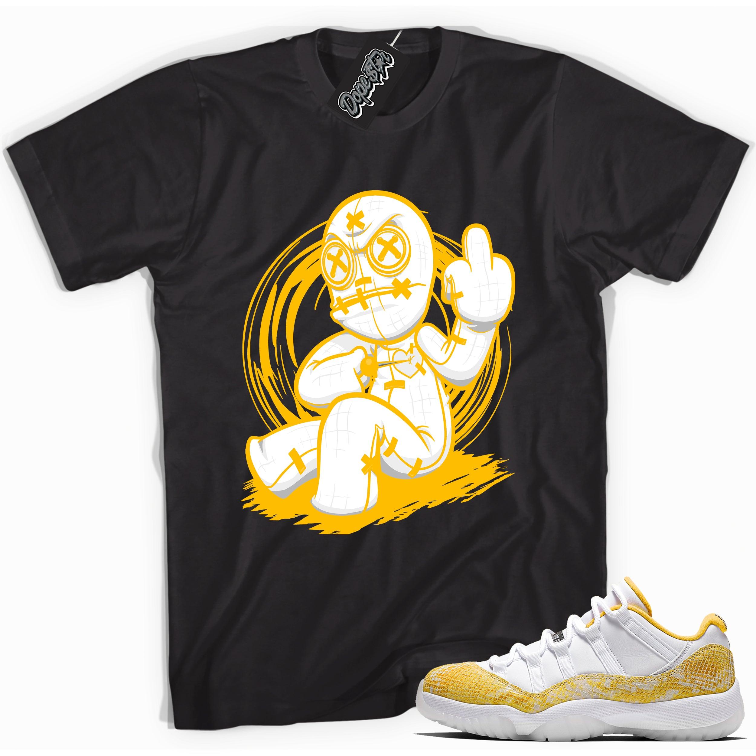 Cool black graphic tee with 'voodoo doll' print, that perfectly matches  Air Jordan 11 Retro Low Yellow Snakeskin sneakers