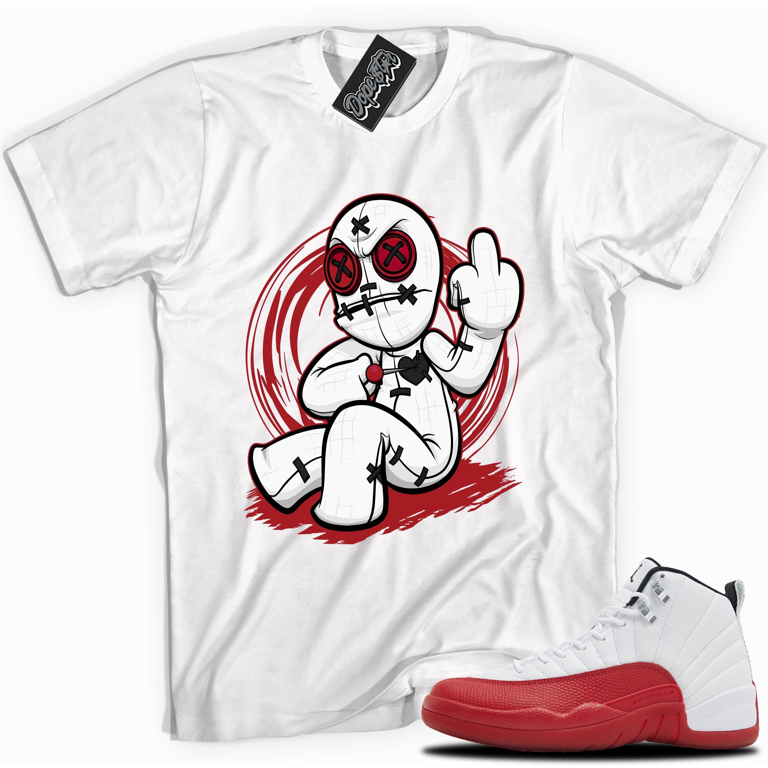 Cool White graphic tee with “VooDoo Doll” print, that perfectly matches Air Jordan 12 Retro Cherry Red 2023 red and white sneakers 