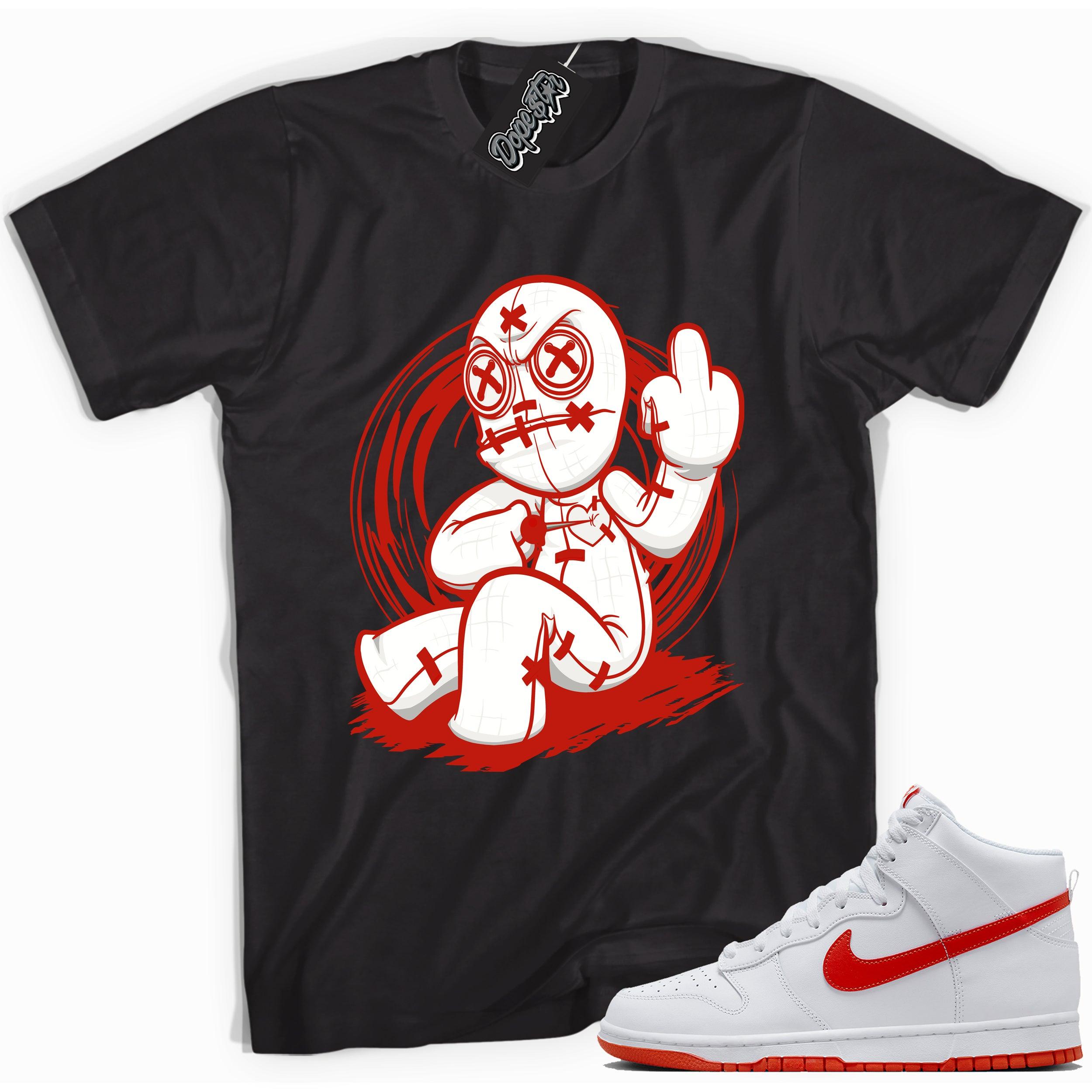 Cool black graphic tee with 'voodoo doll' print, that perfectly matches Nike Dunk High White Picante Red sneakers.