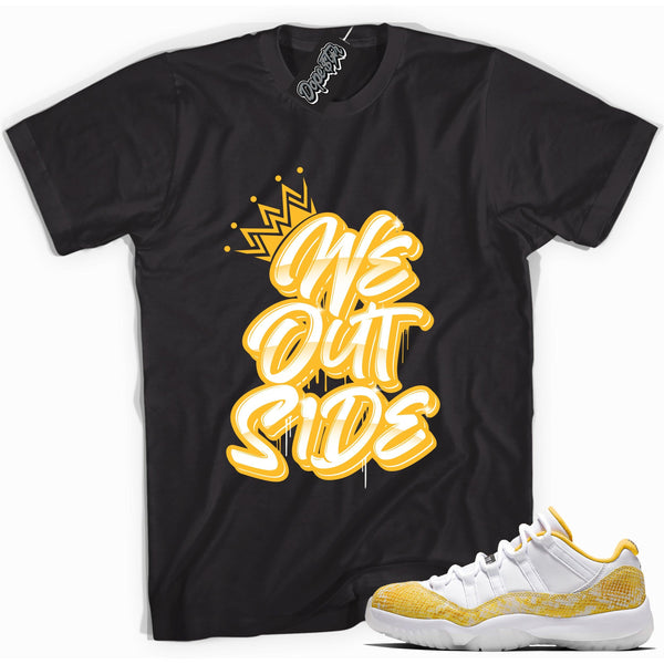 Cool black graphic tee with 'we outside' print, that perfectly matches  Air Jordan 11 Retro Low Yellow Snakeskin sneakers
