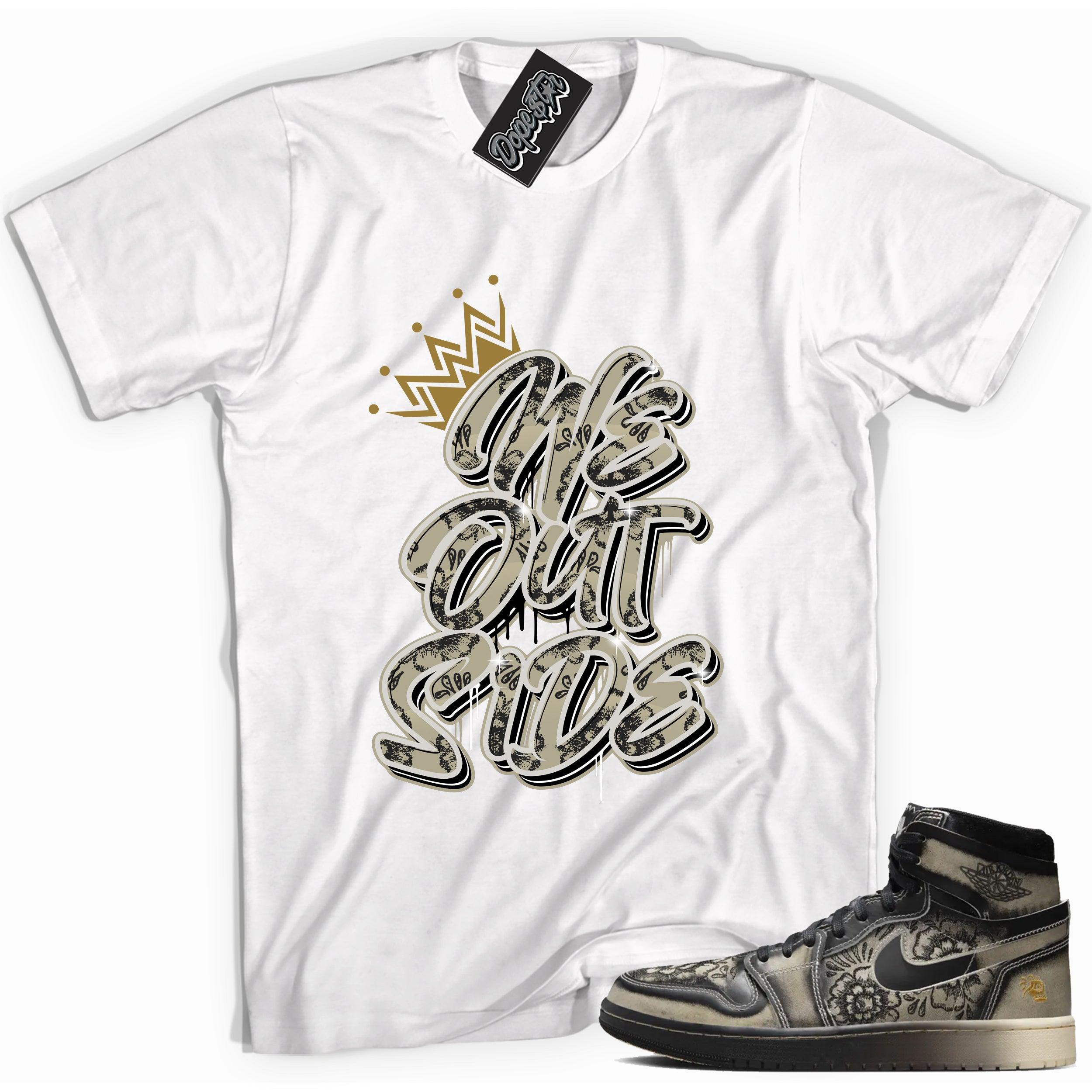 Cool White graphic tee with “ We Outside ” print, that perfectly matches Air Jordan 1 High Zoom Comfort 2 Dia de Muertos Black and Pale Ivory sneakers 