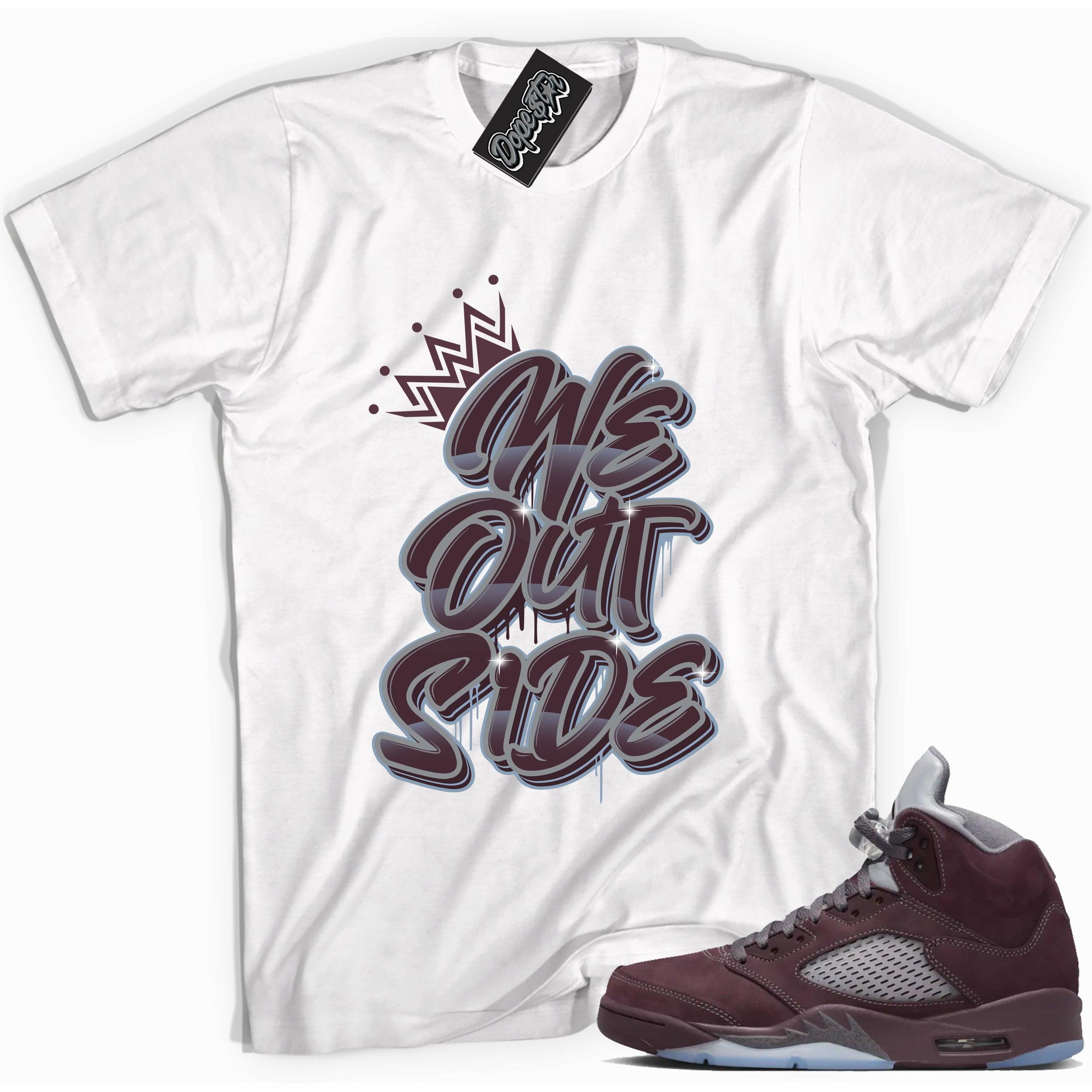 Cool White graphic tee with “ We Outside ” print, that perfectly matches Air Jordan 5 Burgundy 2023 sneakers 