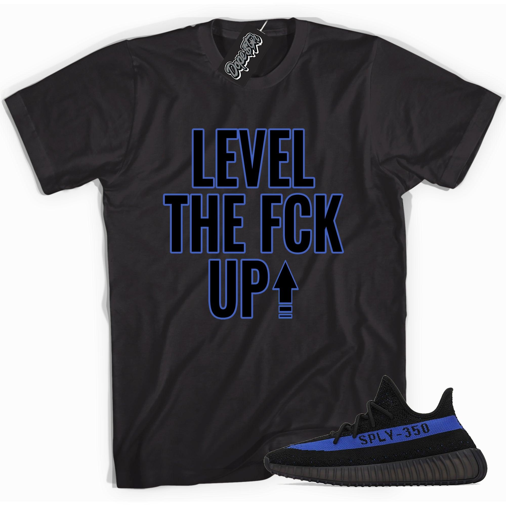 Cool black graphic tee with 'Level Up' print, that perfectly matches Yeezy Boost 350 V2 Dazzling Blue Toe sneakers.