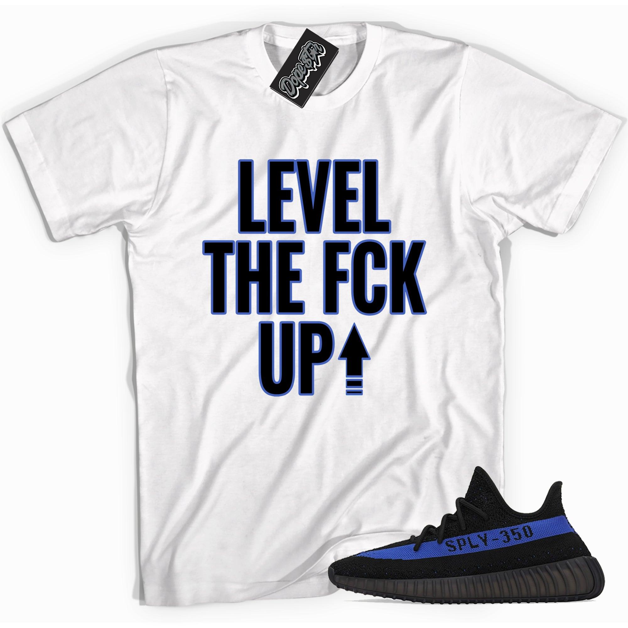 Cool white graphic tee with 'Level Up' print, that perfectly matches Yeezy Boost 350 V2 Dazzling Blue Toe sneakers.