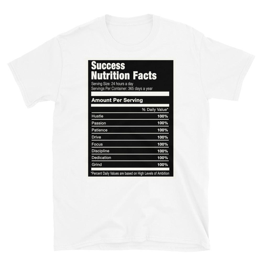Cool white graphic tee with 'success nutrition facts' print, that perfectly matches Nike Air Force 1 Low Ambush Phantom Black sneakers