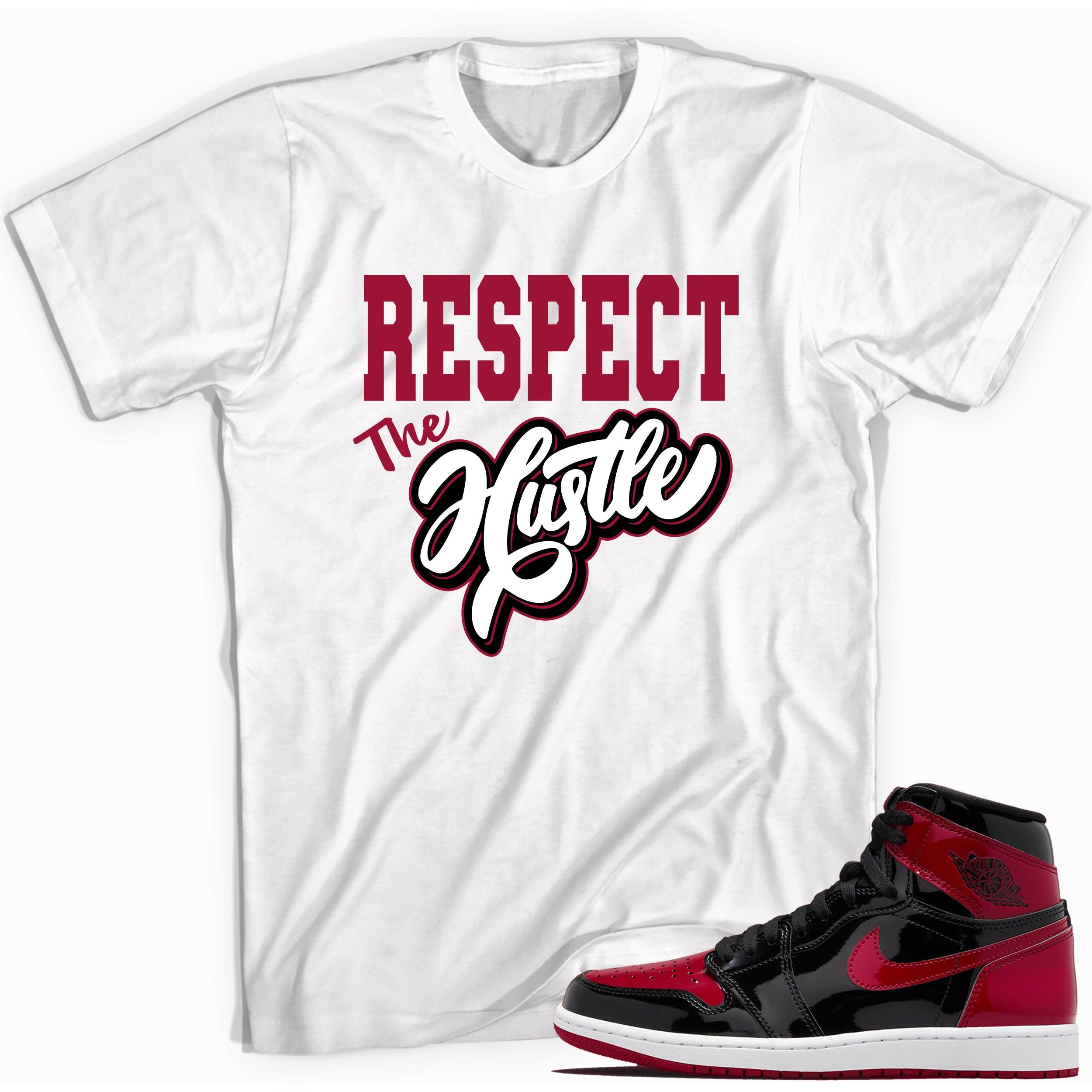 White Respect The Hustle Shirt for Jordan 1s Bred Patent photo